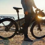 riese-and-muller-charger3-mixte-man-off-bike-at-sunset