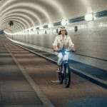 riese-and-muller-nevo3-cycling-down-tunnel