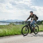 man-riding-onriese-and-muller-delite-ebike