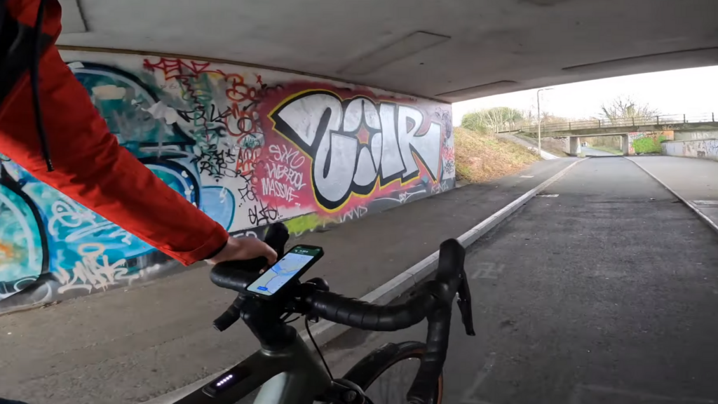 Riese & Müller UBN Five Commute Review: The E-Bike for Your Commute and Weekend Escapes! 3 Dan from Edemo Electric Bikes riding the Riese and Muller UBN Five Commute in an urban setting